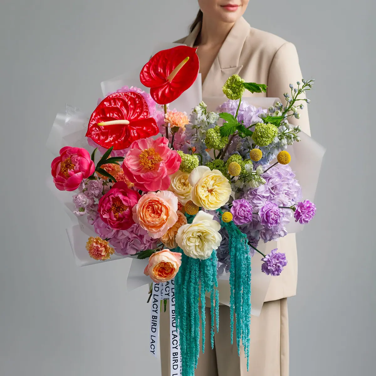 The signature Lacy Bird spreading bouquet